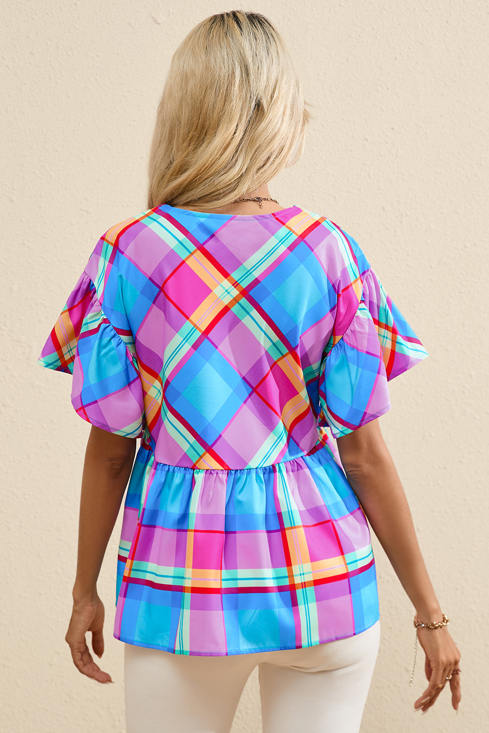 Sky Blue Colorful Plaid V Neck Ruffled Babydoll BlouseMaterial:100%Polyester



		This plaid blouse is vibrant and attention-getting
	
	
		The babydoll design is very graceful and loved by customers
	
	
		Sexy v