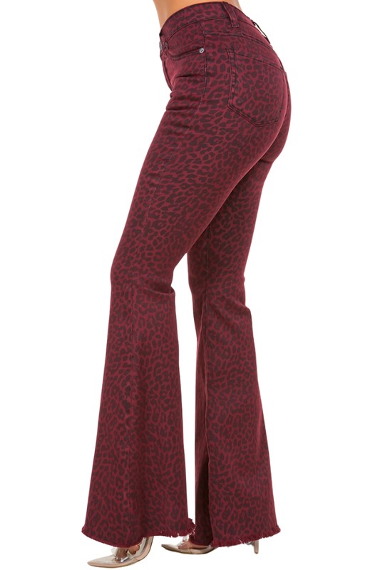 Leopard Bell Bottom Jean in BurgundyFull Length 5 pocket bell bottom jean features frayed hem, Front and back pockets, Burgundy Denim leopard Print,33.5" inseam, 10.5" Rise, Stretch Denim, Made in USAM