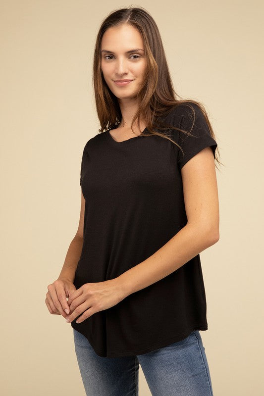 Flowy Round Hem Rayon Short Sleeve TopThe Flowy Round Hem Rayon Short Sleeve Top is the perfect addition to your casual wardrobe. Crafted from soft, lightweight rayon, this top features a relaxed fit and