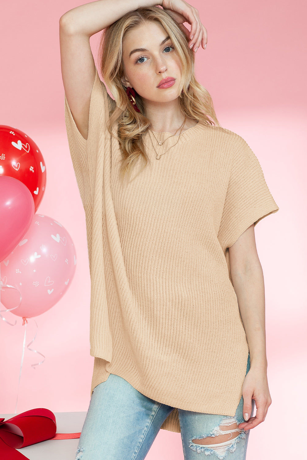 Apricot Side Slit Short Sleeve Oversized SweaterMaterial:55%Acrylic+45%Cotton



		The sweater is a comfortable and chic addition to your wardrobe. Made from breathable, lightweight, and stretchy knitted fabric,