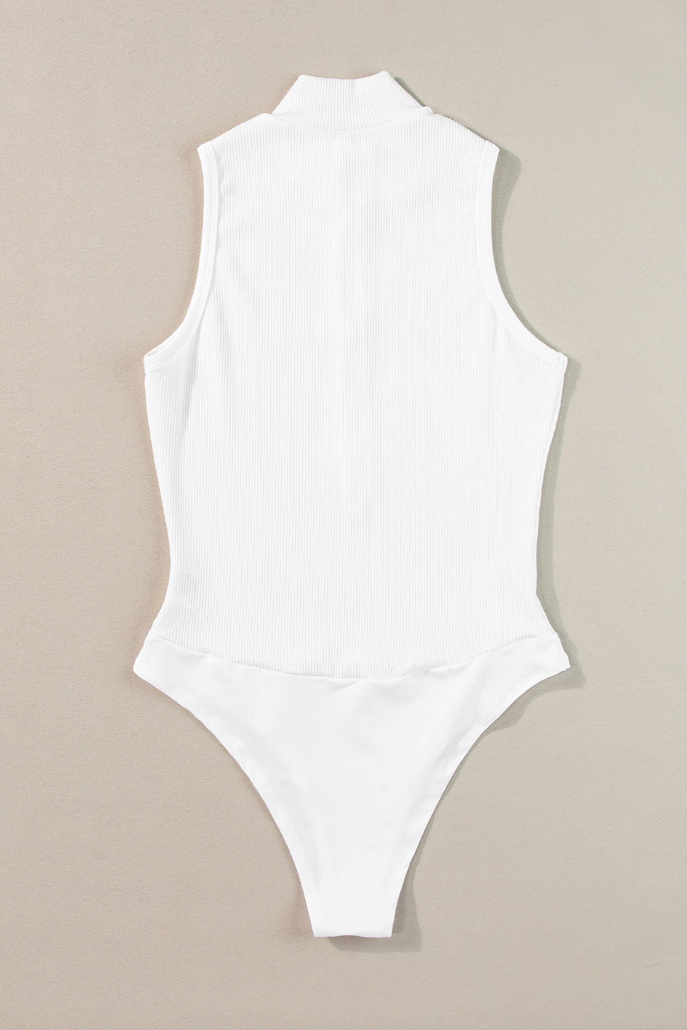 White Zip Up Mock Neck Ribbed Sleeveless BodysuitMaterial:95%Polyester+5%Elastane



		The zip-up feature of this chic bodysuit provides convenient on and off access. 
	
	
		Adding a touch of sophistication an