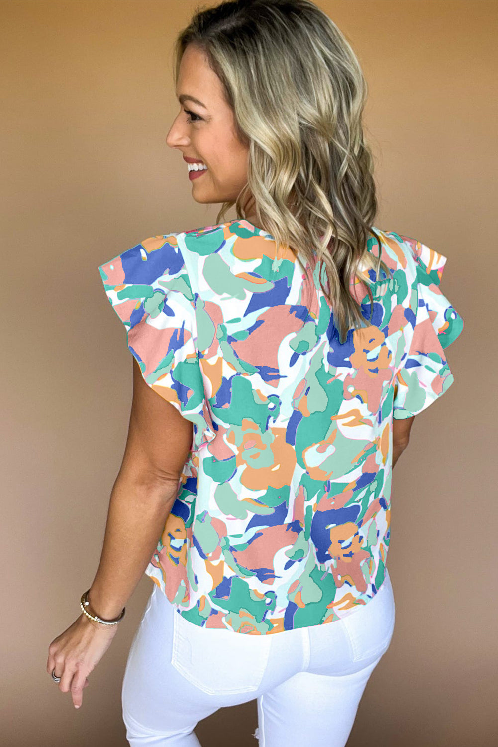 Green Abstract Print Smocked Notched Neck Ruffle Sleeve BlouseMaterial:100%Polyester

• Embrace a bohemian spirit with the blouse, featuring a vibrant green hue that adds a pop of color to any outfit.
• The abstract print des