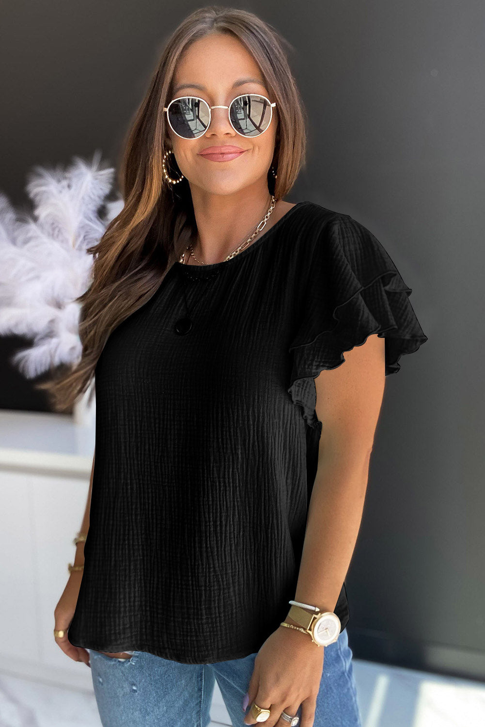 Black Textured Tiered Ruffle Casual Short Sleeve TopMaterial:100%Cotton



		•The tiered ruffle sleeves add a feminine touch to the blouse and make it stand out.
	
	
		•The blouse can be styled in many different 