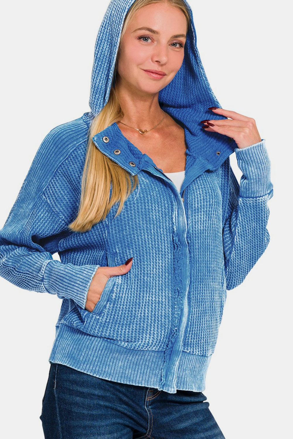 Zenana Washed Zip Up Hooded JacketThis washed zip-up hooded jacket is a stylish and versatile addition to your outerwear collection. The washed finish gives it a trendy and lived-in look that can eas