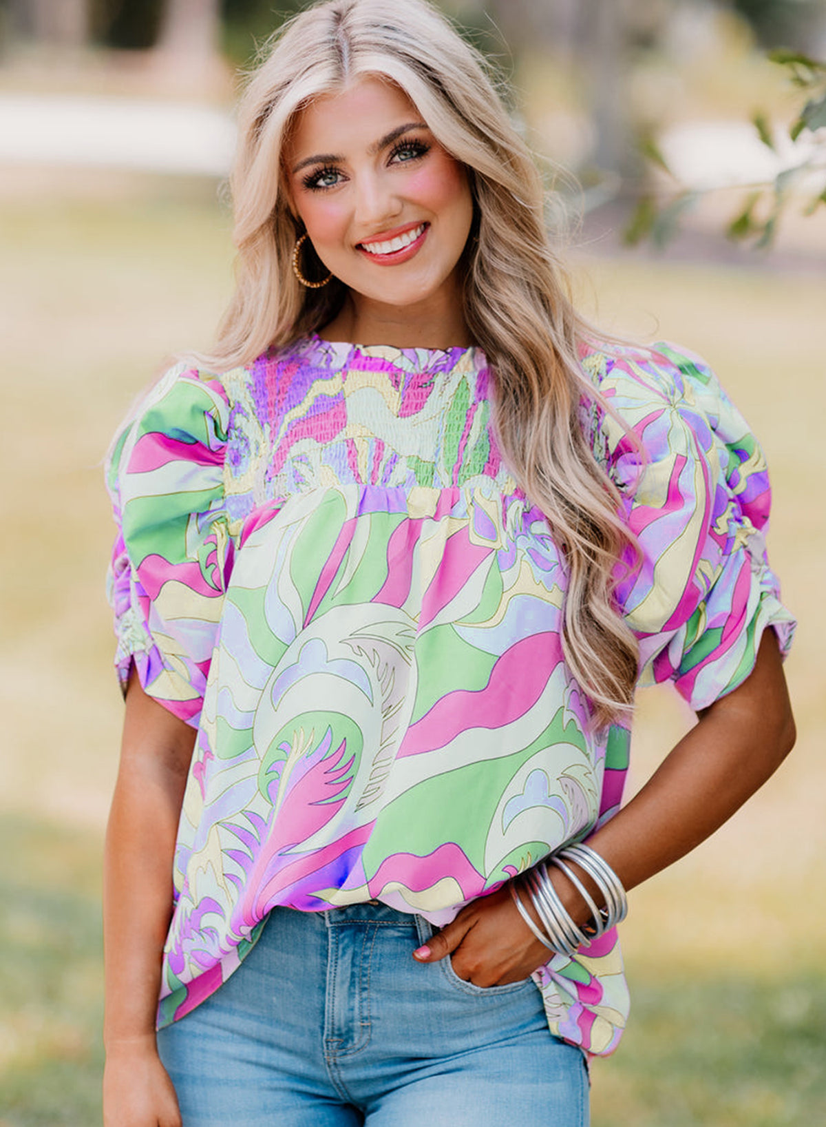 Pink Abstract Print Smocked Bubble Sleeve BlouseMaterial:100%cotton


	


		The blouse features a vibrant and unique abstract print, adding a pop of color to your outfit.
	
	
		The bubble sleeves add a play