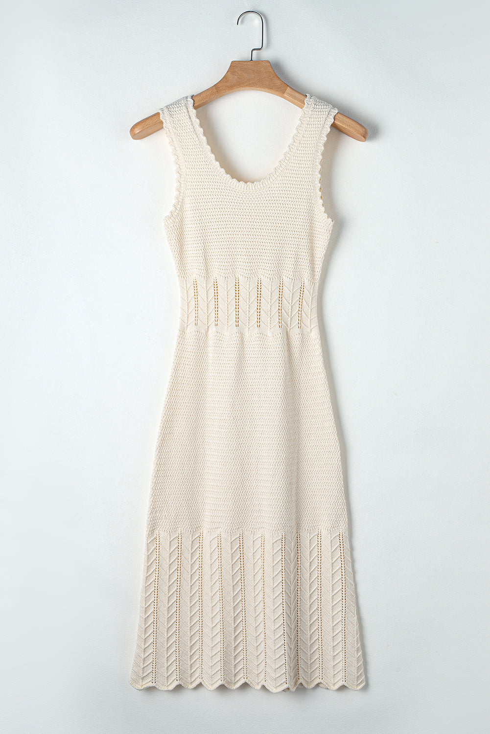 Beige Mix Texture Knitted Ruffle Hem Sleeveless Midi DressMaterial:89%Cotton+11%Polyamide

• Unique mix texture design gives this dress a modern edge, blending knit and ruffle elements seamlessly for a sophisticated look. 