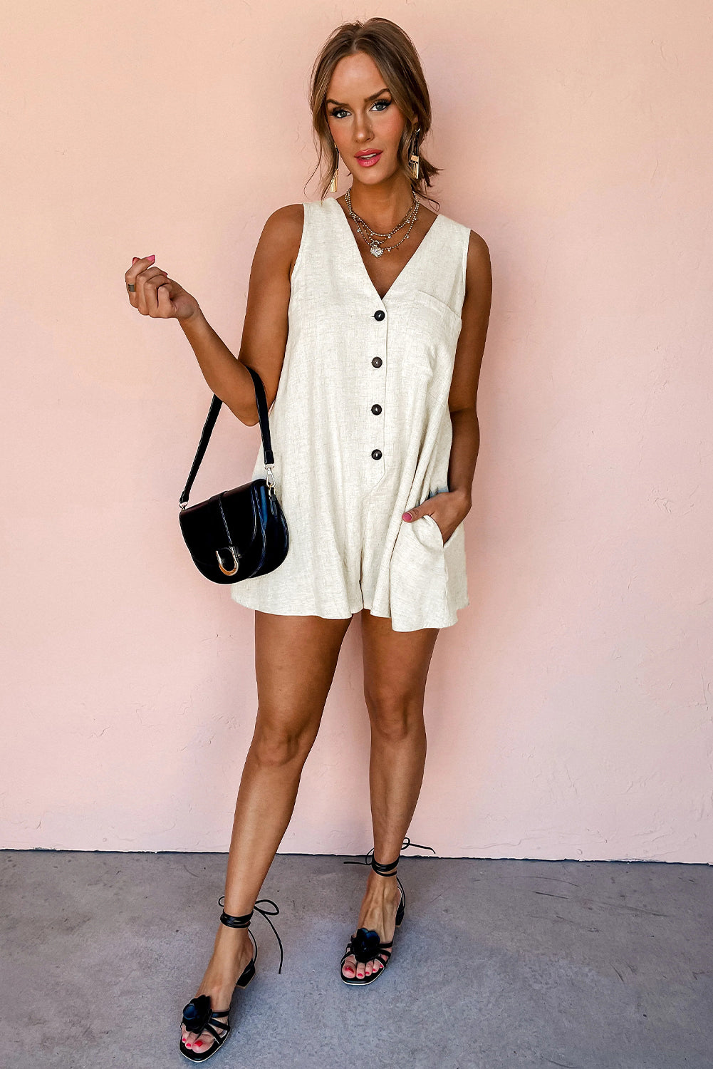 Beige V Neck Buttoned Front Chest Pocket Sleeveless RomperMaterial:92%Viscose+8%Linen

• Effortlessly chic, this romper exudes casual sophistication with its plain design and convenient chest pocket, perfect for a day out 