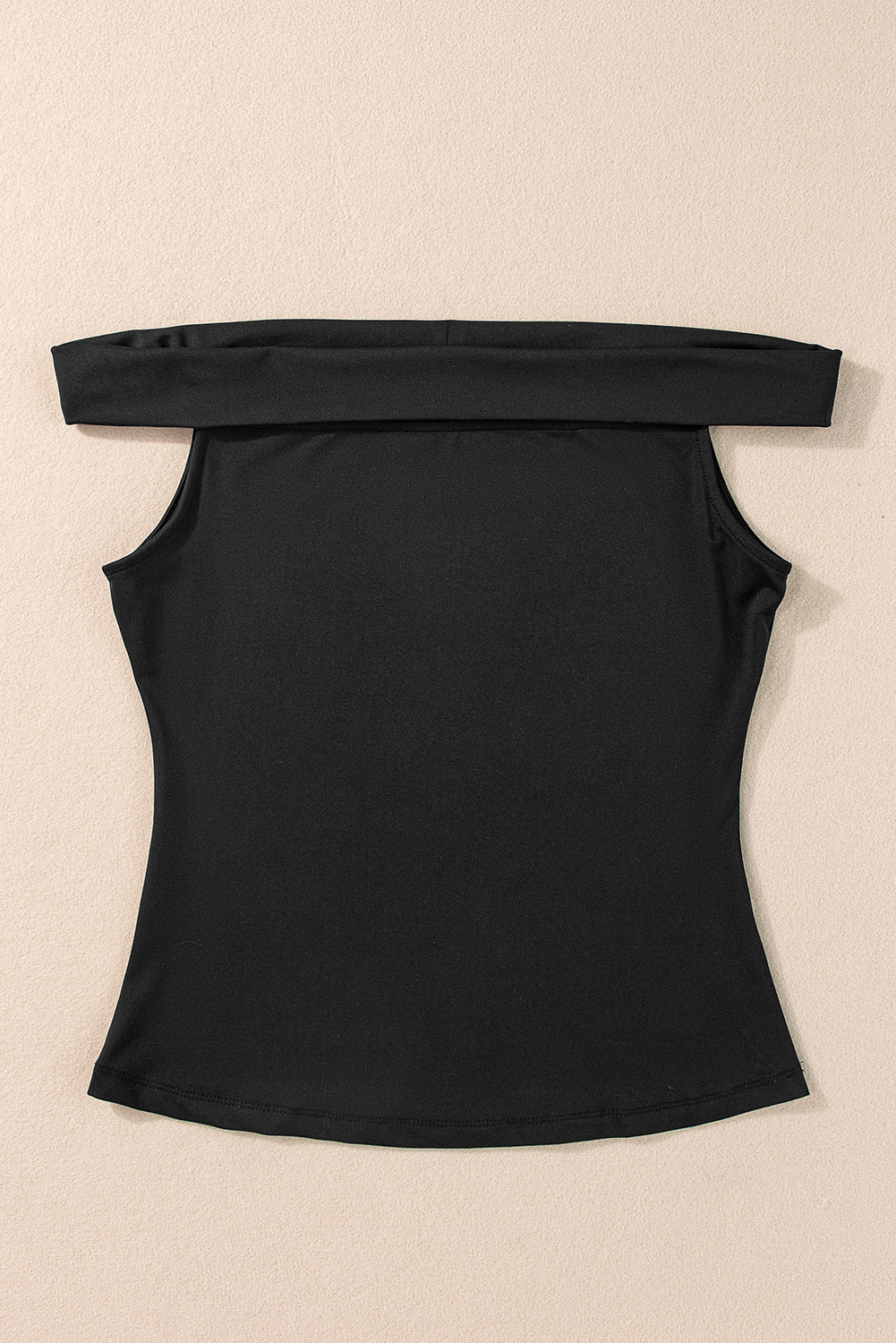 Black Solid Color Folded Off Shoulder Slim BlouseMaterial:92%Polyester+8%Elastane



		This trendy and flattering slim top is crafted to provide a fashionable and modern look, making it a versatile choice for var