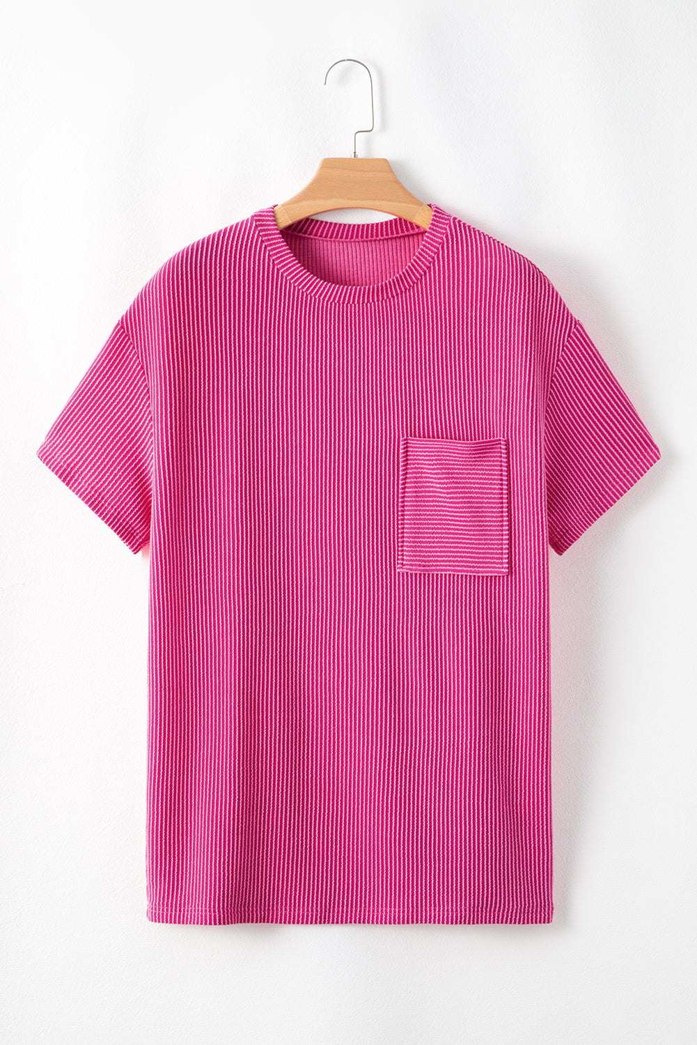 Pink Crinkle Rib Knit Pocketed Loose Fit Crew Neck T ShirtMaterial:75%Polyester+20%Viscose+5%Elastane

• Pink T Shirt offers a charming, feminine touch with its soft pink color and crinkle rib texture, perfect for a casual