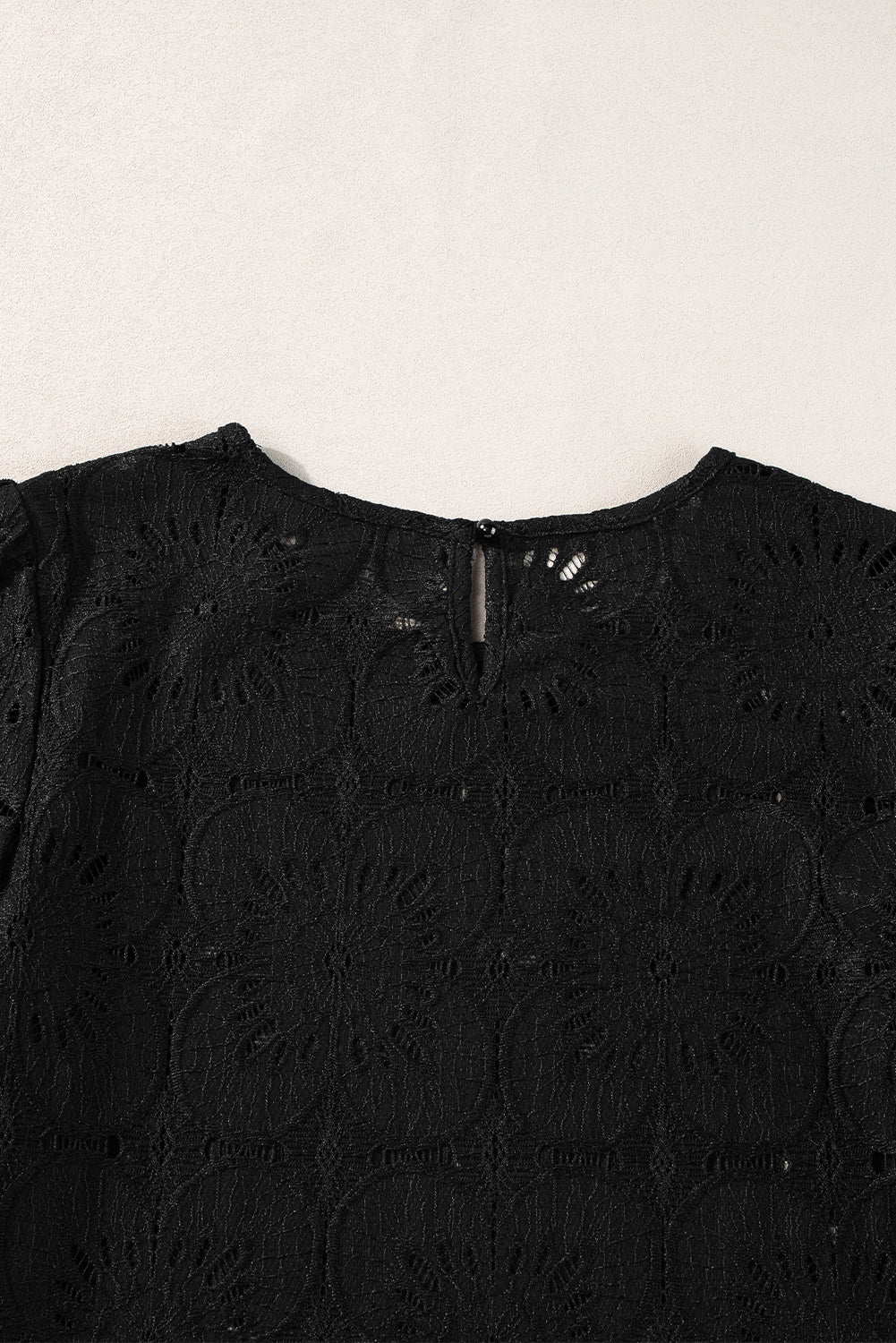 Black Flower Eyelet Jacquard Keyhole Back Puff Sleeve TopMaterial:70%Cotton+30%Polyamide

• Elevate your wardrobe with the top, featuring intricate eyelet detailing and elegant puff sleeves for a touch of sophistication. 