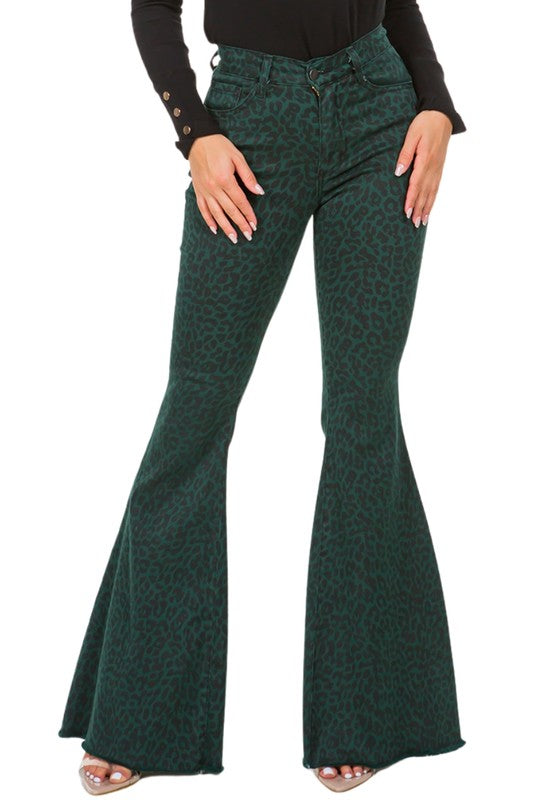 Leopard Bell Bottom Jean in Pine GreenFull Length 5 pocket bell bottom jean features frayed hem, Front and back pockets, Pine green Denim leopard Print,34" inseam, 10.5" Rise, Stretch Denim, Made in USA
