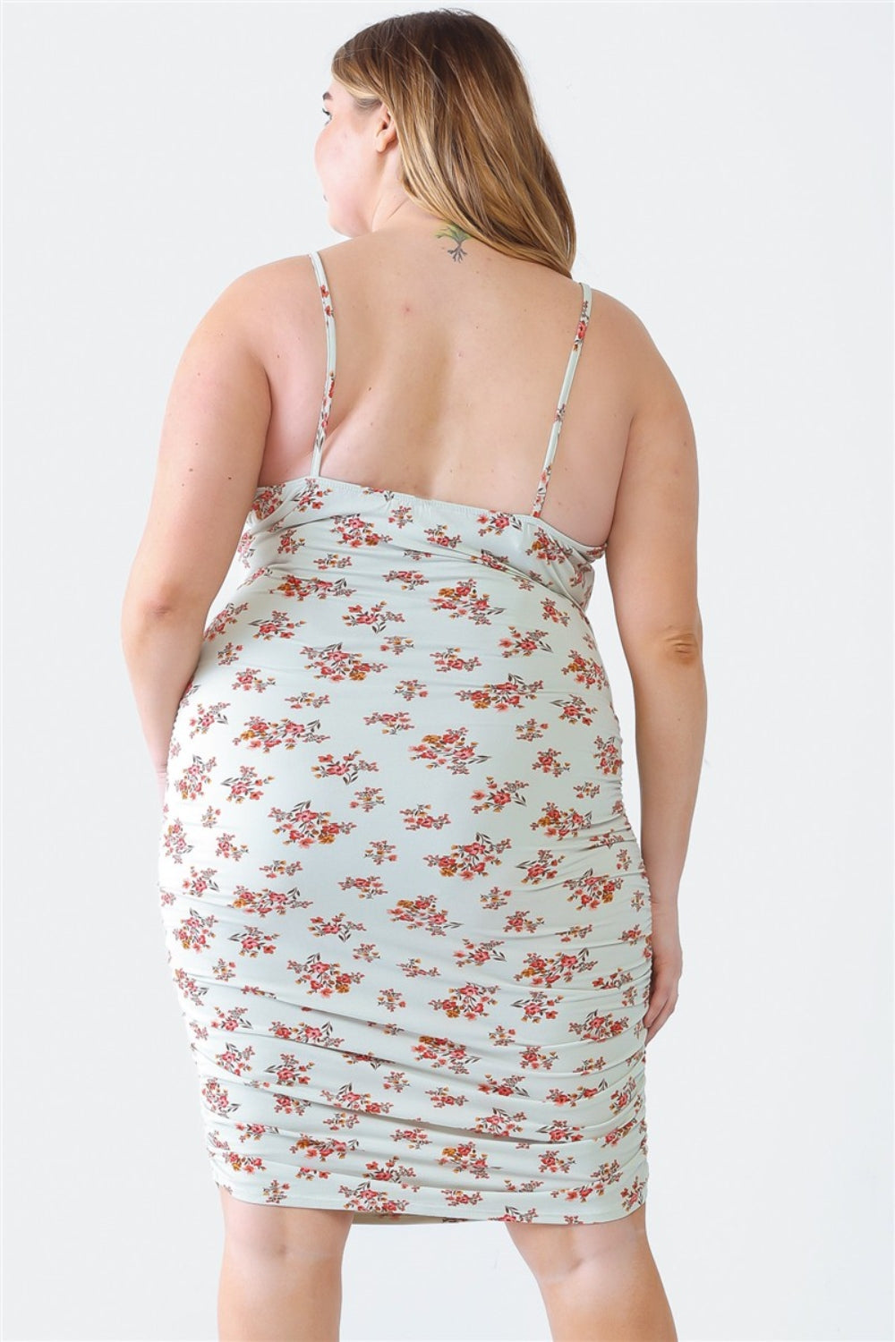 Blue Leopard Plus Size Ruched Floral Square Neck Cami DressRuched Floral Square Neck Cami Dress is a trendy and feminine piece that effortlessly combines style and comfort. The square neckline adds a chic touch, while the ru