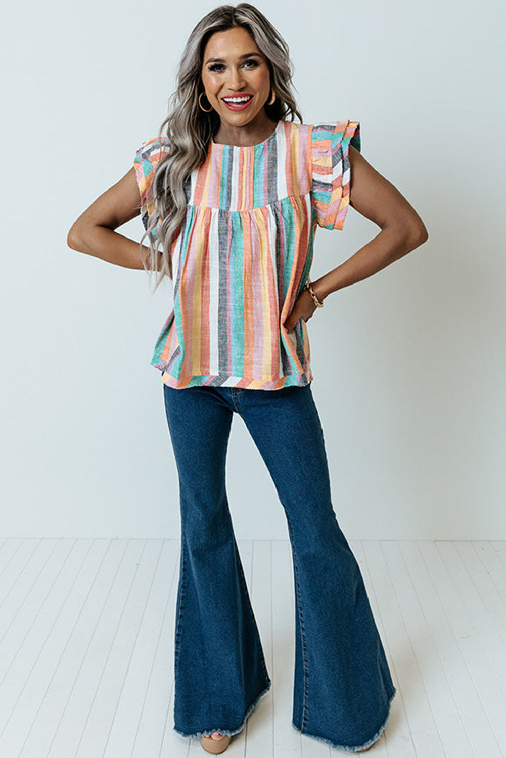 Multicolor Striped Back Button Keyhole Layered Sleeve BlouseMaterial:100%Polyester



		Vibrant and eye-catching striped print design.
	
	
		Tiered sleeves add a unique and stylish touch to the blouse.
	
	
		Pair with