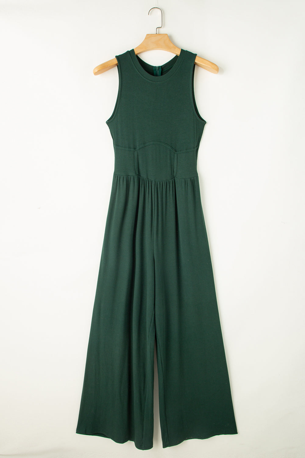 Blackish Green Sleeveless High Waist Wide Leg JumpsuitMaterial:93%Viscose+7%Elastane



		The jumpsuit features a sleeveless design, meaning it does not have sleeves and exposes the arms. 
	
	
		The jumpsuit has a 