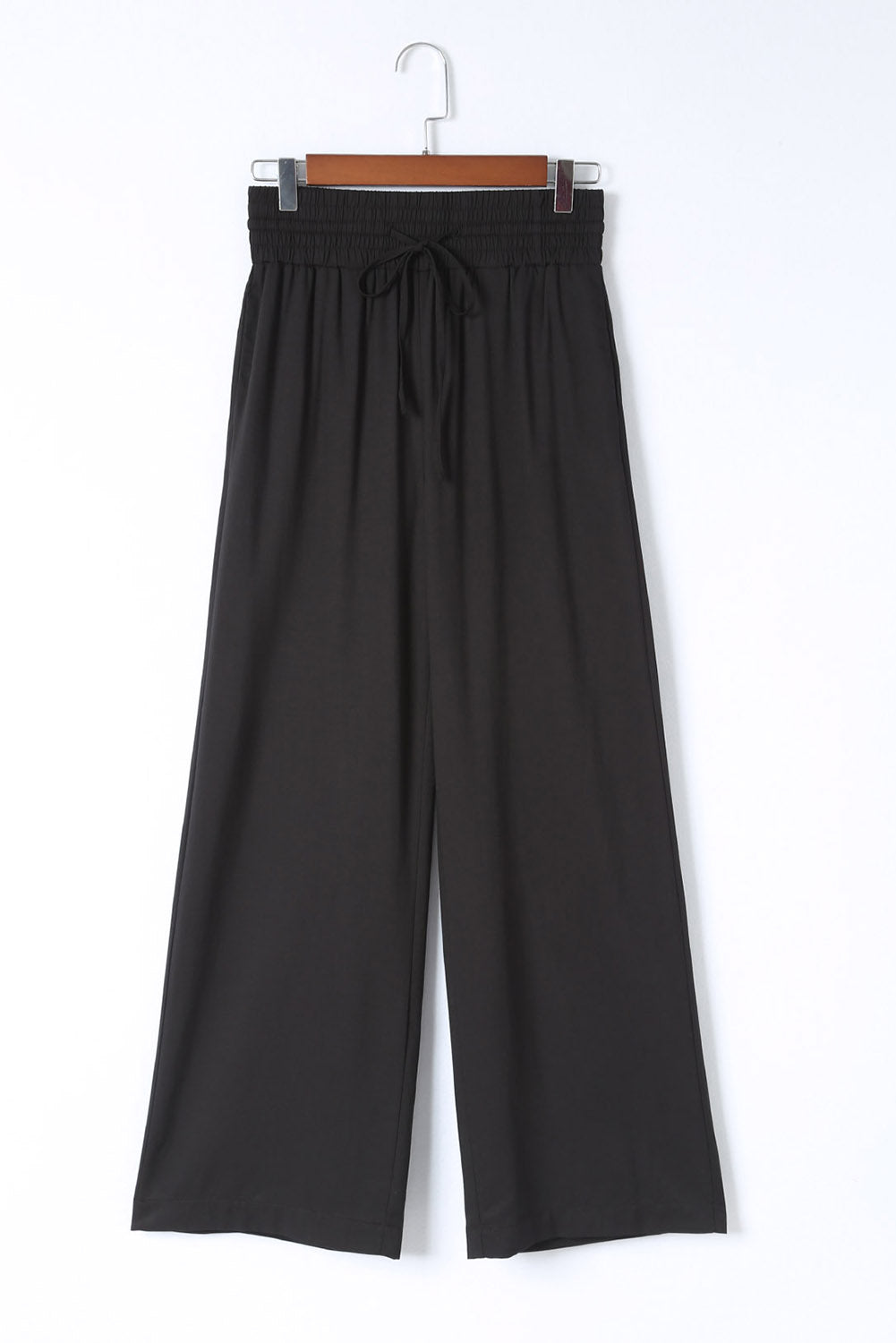 Blue Casual Drawstring Shirred Elastic Waist Wide Leg PantsMaterial:65%Viscose+35%Polyester



		These wide leg pants
are casual and comfy with a loose fit style
	
	
		The smocked waist
design is fashionable and very 