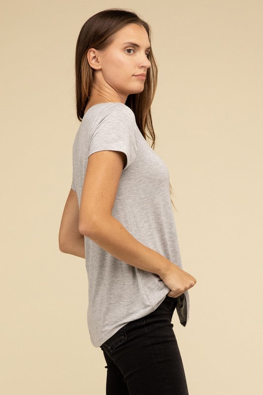 Flowy Round Hem Rayon Short Sleeve TopThe Flowy Round Hem Rayon Short Sleeve Top is the perfect addition to your casual wardrobe. Crafted from soft, lightweight rayon, this top features a relaxed fit and