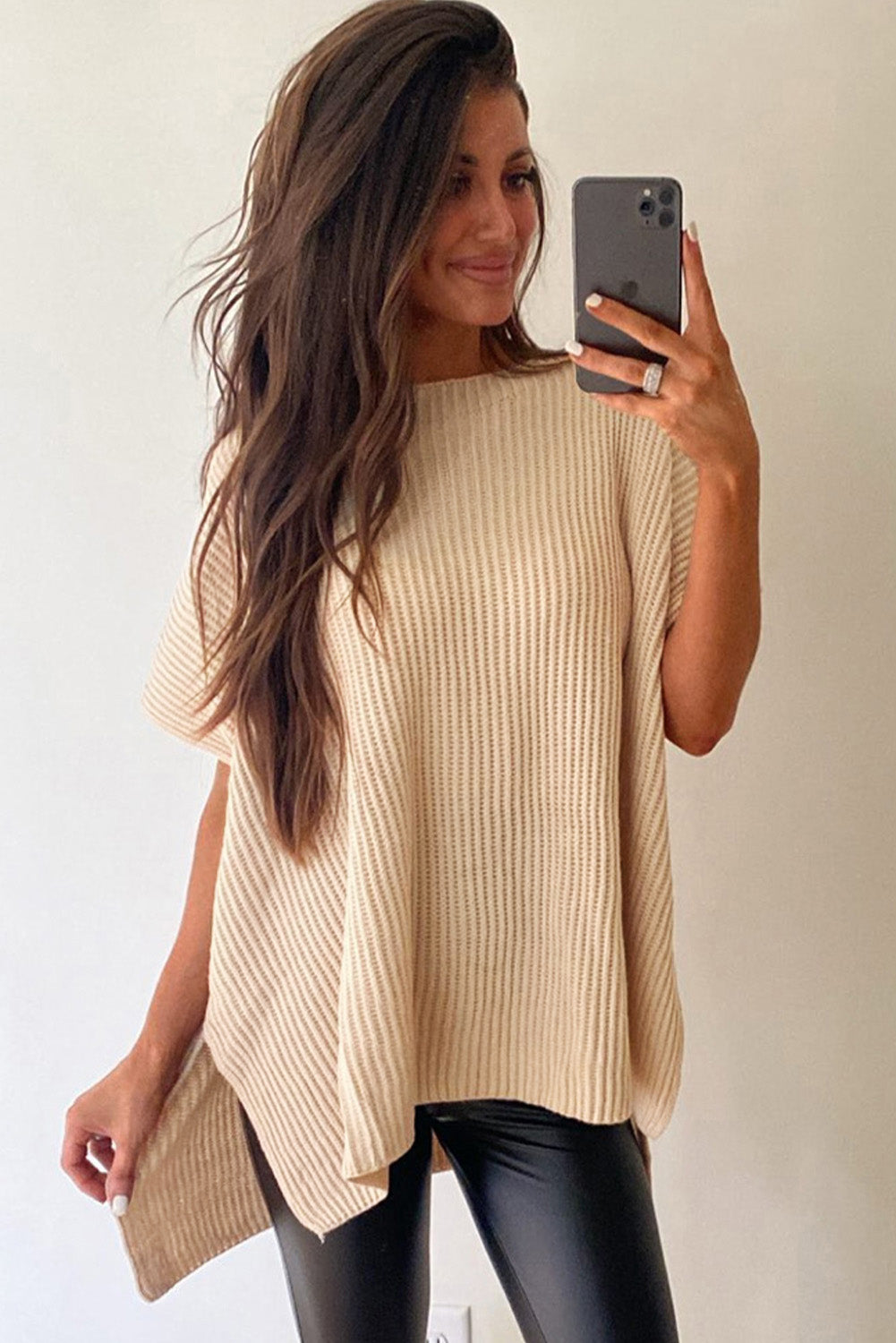 Apricot Side Slit Short Sleeve Oversized SweaterMaterial:55%Acrylic+45%Cotton



		The sweater is a comfortable and chic addition to your wardrobe. Made from breathable, lightweight, and stretchy knitted fabric,