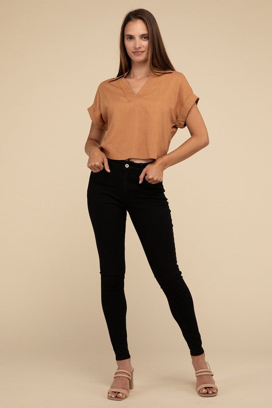 Always a Delight Short Sleeve Linen TopExperience everyday elegance with our Always a Delight Short Sleeve Linen Top. This top exudes understated sophistication with its collared V-neck and cuffed short s