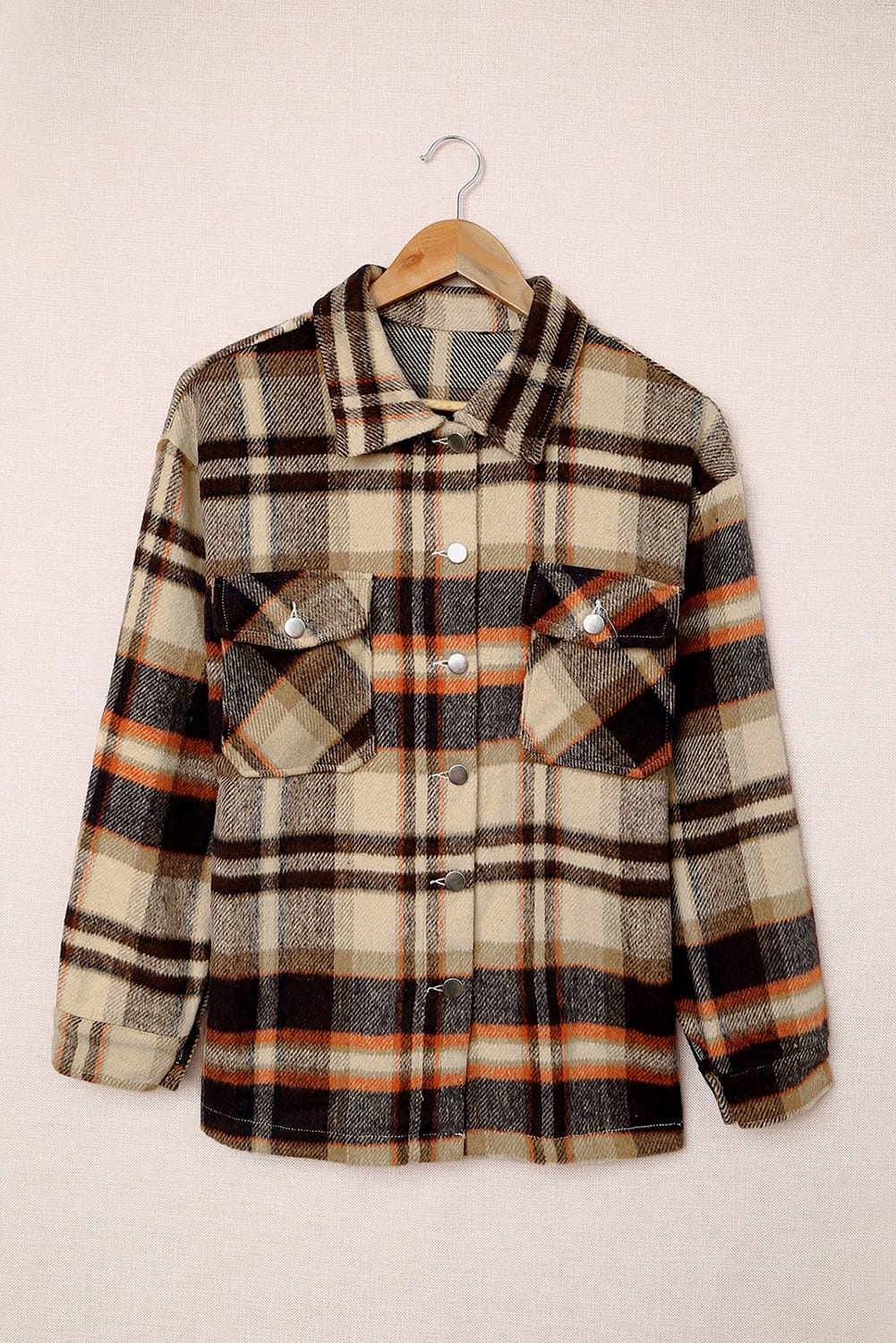 Khaki Plaid Print Casual Button Up Pocket ShacketMaterial:100%Polyester



		Sweet yet rugged plaid details adorn this cozy shirt
	
	
		Designed with a button front, long sleeves, large front pockets &amp; an 