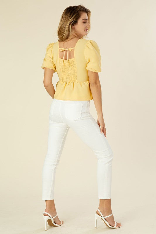 Bubbles sleeved blouse with peplum- Bubbles sleeved blouse with peplum, back tie for closing- Pattern type : solid- Neck line : square neck- Sleeve type : bubble sleeves- Sleeve length : short sleeve