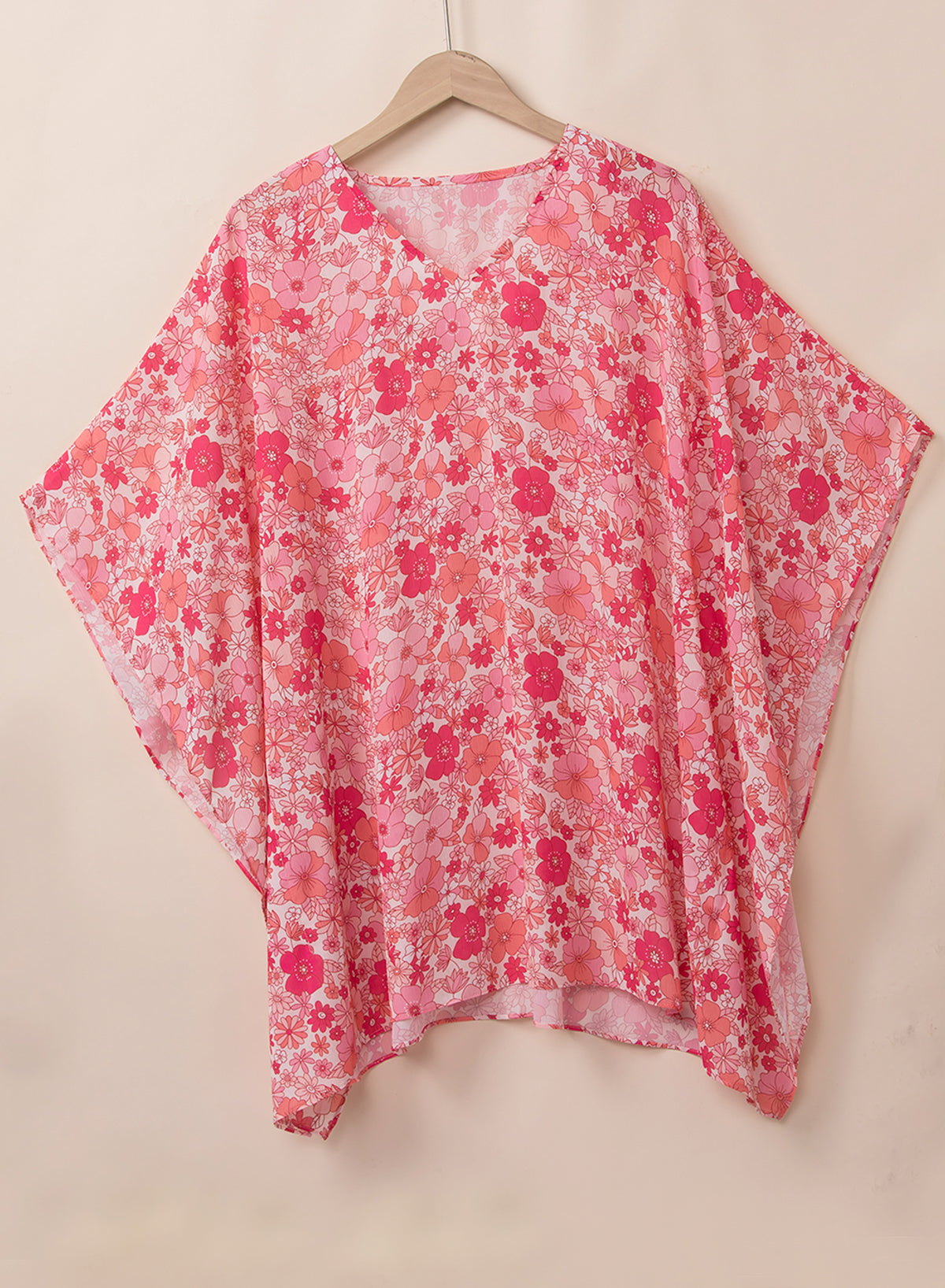 Pink Boho Floral Print V Neck Oversized BlouseMaterial:100%Polyester



		This oversized blouse is not only cool and comfortable but also suitable for any figure, making it a versatile choice for various body 