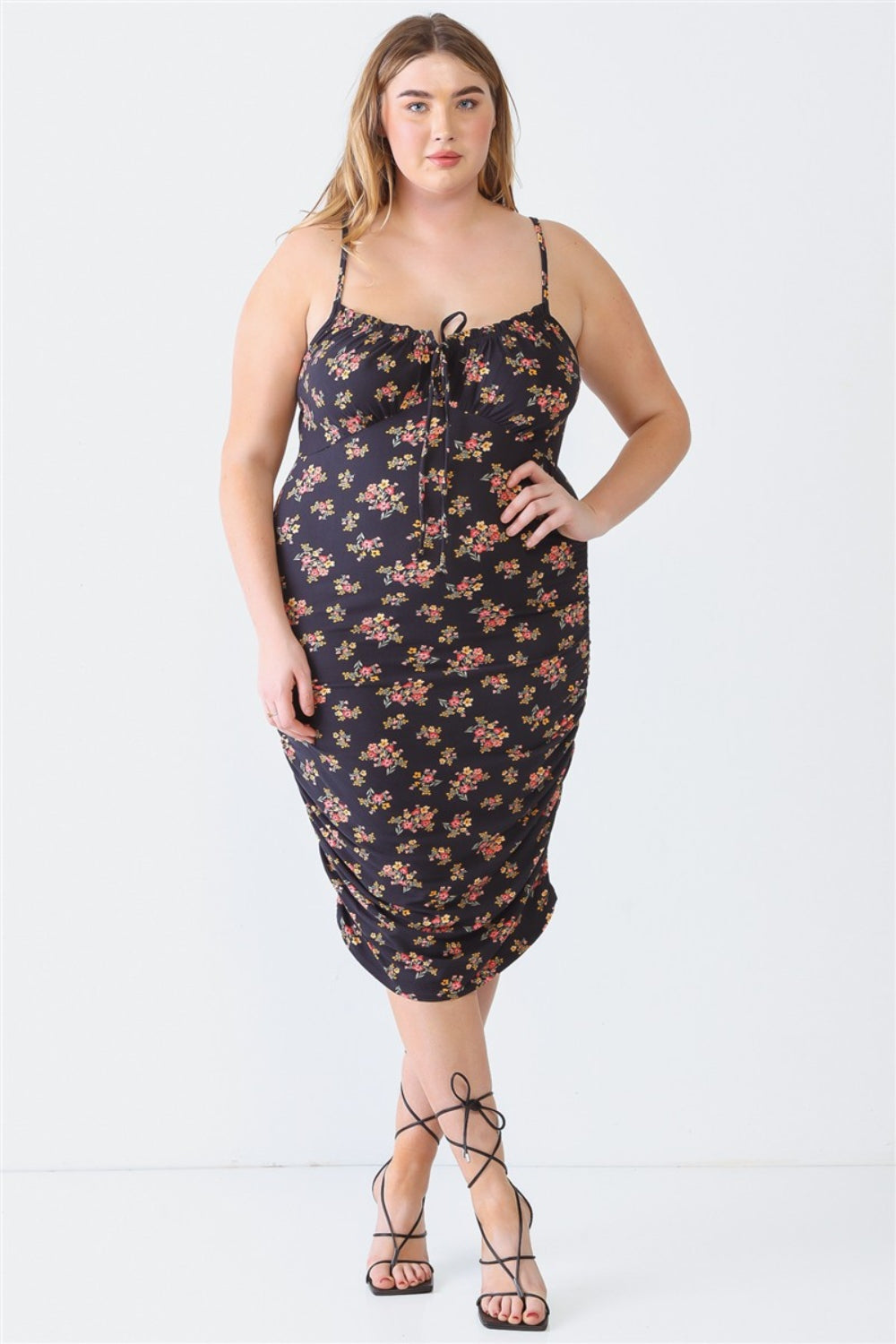 Blue Leopard Plus Size Ruched Floral Square Neck Cami DressRuched Floral Square Neck Cami Dress is a trendy and feminine piece that effortlessly combines style and comfort. The square neckline adds a chic touch, while the ru