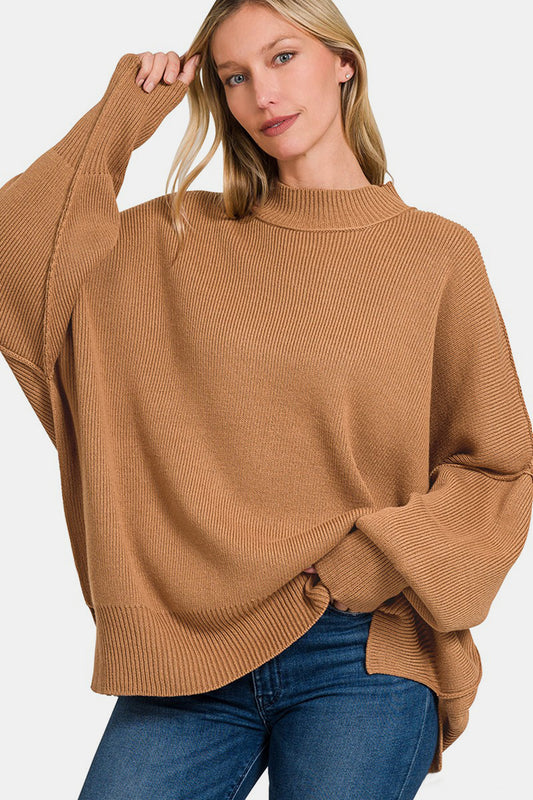 Zenana Side Sit Oversize SweaterSide Slit Oversize Sweater is a trendy and comfortable choice for your casual wardrobe. The oversized fit adds a relaxed and effortless vibe to your outfit. With sid