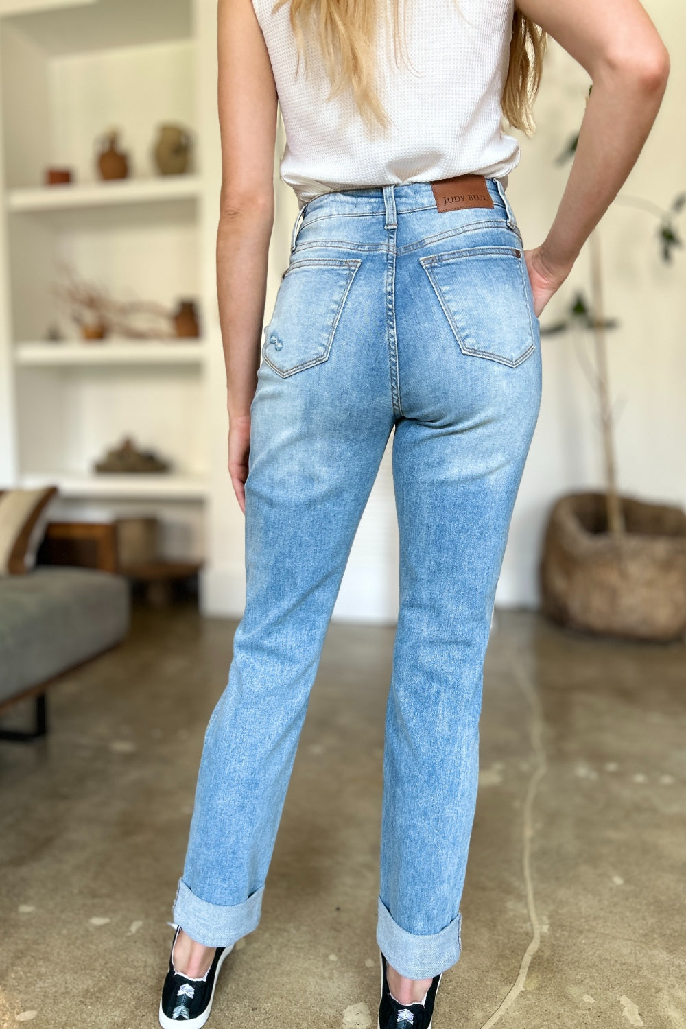 Judy Blue Full Size Distressed Straight Jeans with Patch PocketsThese distressed straight jeans feature stylish patch pockets for added flair. The distressed detailing adds a trendy touch to your look. The straight cut offers a f