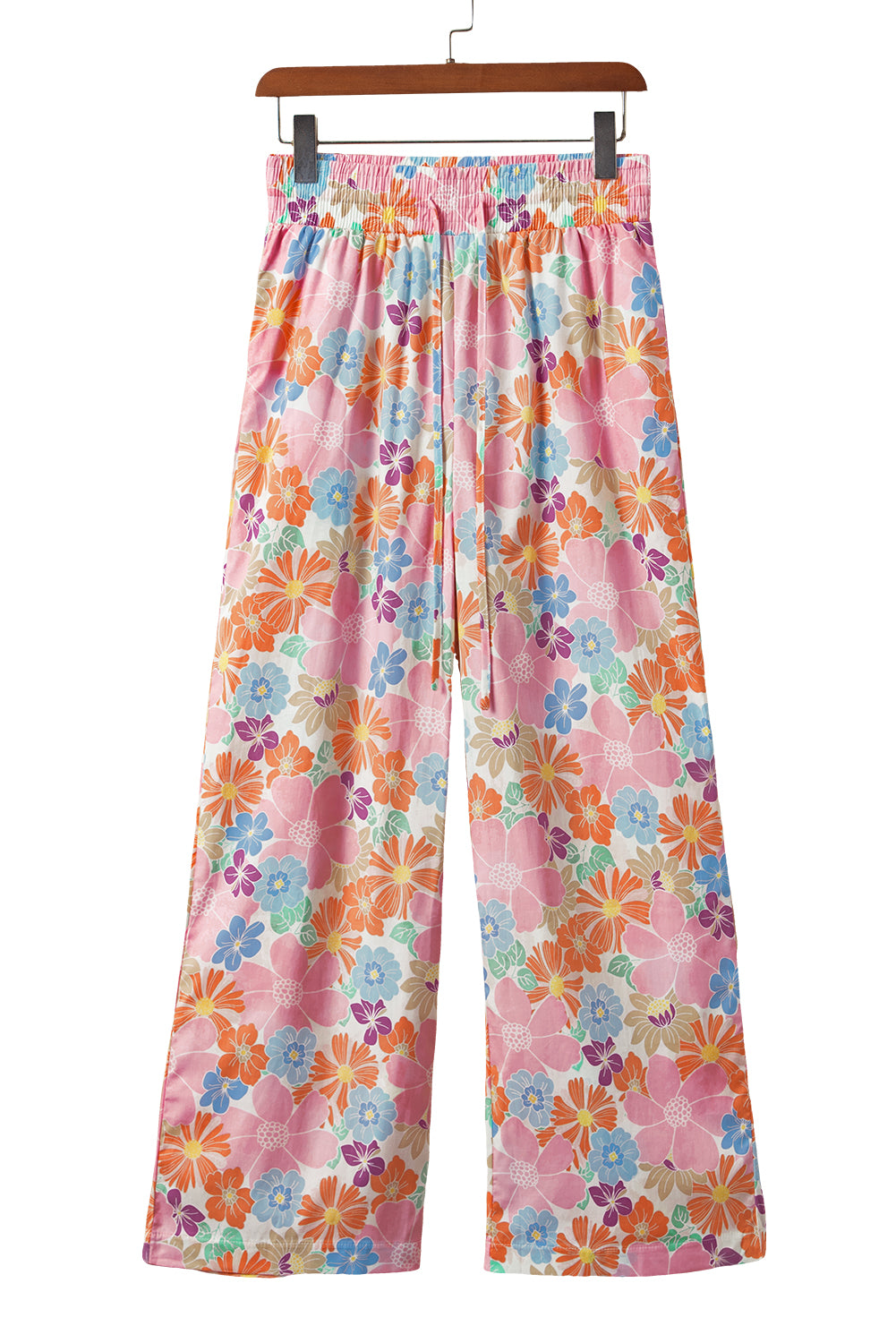 Green Floral Print Smocked Waist Loose PantsMaterial:100%Cotton


	


		The pants feature a vibrant and stylish floral print, adding a pop of color and flair to your wardrobe.
	
	
		Designed with a smoc