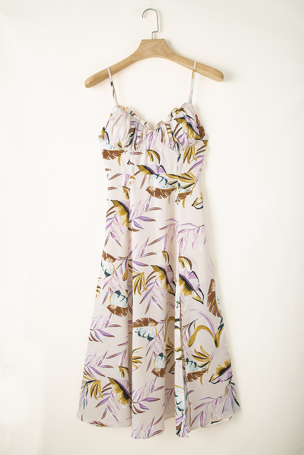 Apricot Tropical Print Spaghetti Straps Cupped DressMaterial:100%Polyester



		The tropical print dress is perfect for summer
	
	
		It’s so sexy with spaghetti straps and slit design
	
	
		Features frilly cup