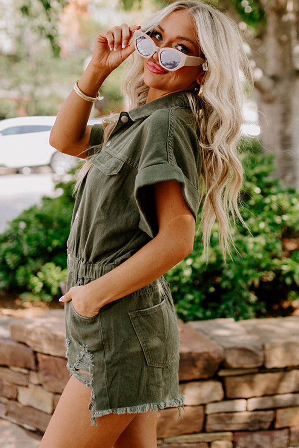 Moss Green Distressed Frayed Denim RomperMaterial:98%Cotton+2%Elastane

• This romper offers a comfortable and stretchy fit for all-day wear.
• The moss green hue brings a touch of nature-inspired charm, 