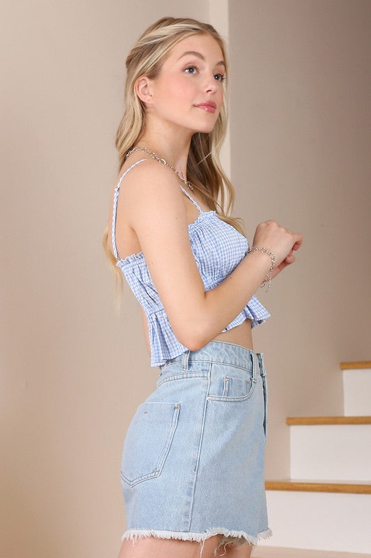 Blue gingham tank top*Blue gingham tank top*Pattern type : gingham *Sleeve length : sleeveless*Stretch : no stretch*Sheer : not lined, but not sheer*Care instruction : machine wash cold,