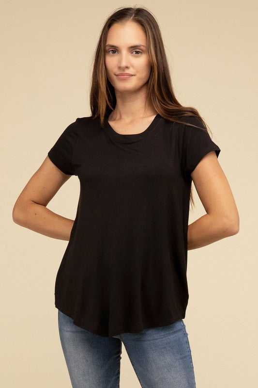 Flowy Round Hem Rayon Short Sleeve TopThe Flowy Round Hem Rayon Short Sleeve Top is the perfect addition to your casual wardrobe. Crafted from soft, lightweight rayon, this top features a relaxed fit and