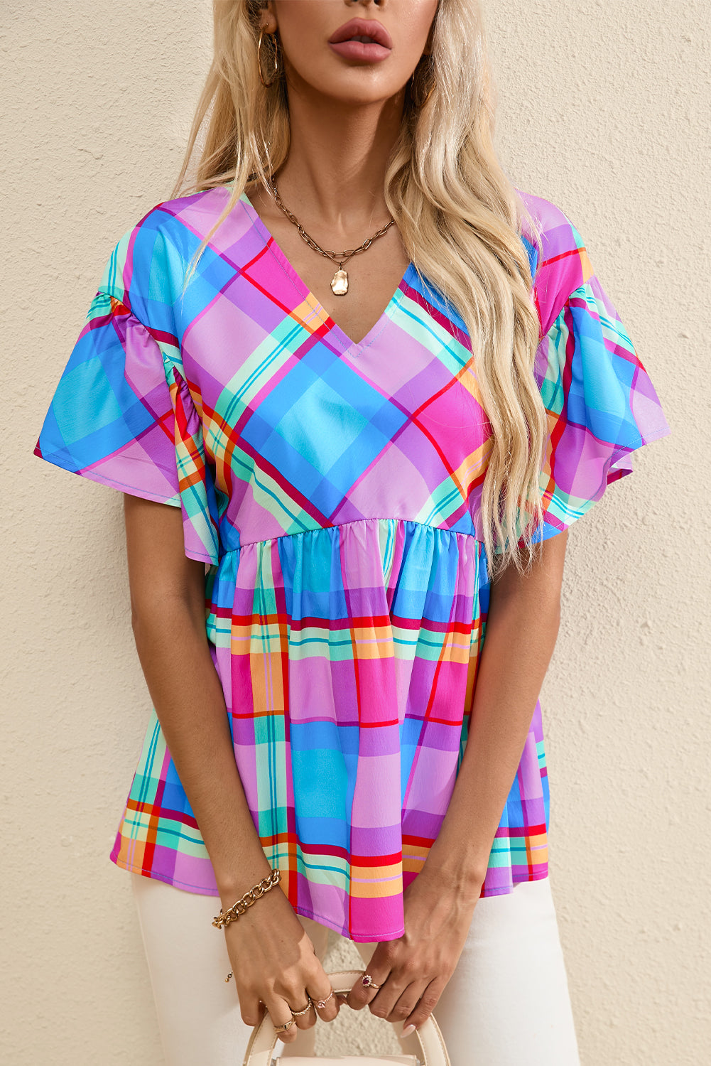 Sky Blue Colorful Plaid V Neck Ruffled Babydoll BlouseMaterial:100%Polyester



		This plaid blouse is vibrant and attention-getting
	
	
		The babydoll design is very graceful and loved by customers
	
	
		Sexy v