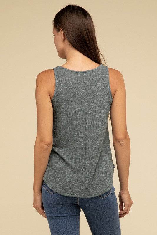 V Neck Sleeveless Cami TopThe V Neck Sleeveless Cami Top is a chic and versatile addition to any wardrobe. Featuring a flattering V neckline and a sleeveless design, this cami top is perfect 