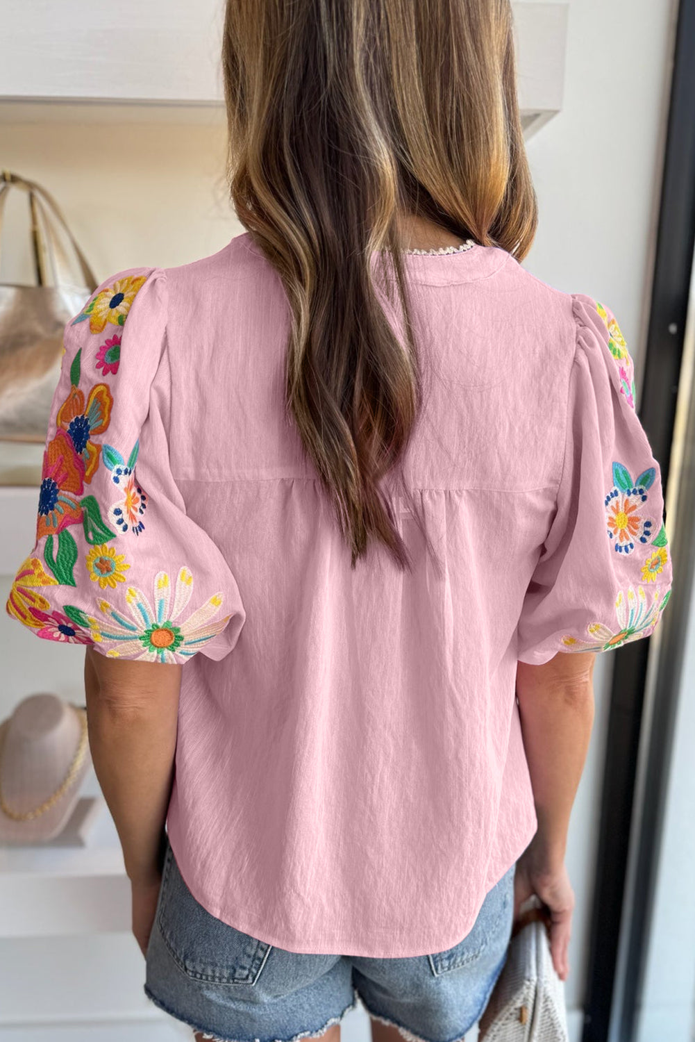 Mineral Red Floral Embroidered Puff Sleeve Split Neck BlouseMaterial:100%Cotton

• Radiate bohemian charm with the Mineral Red blouse featuring intricate floral embroidery and puff sleeves, perfect for a free-spirited look.
