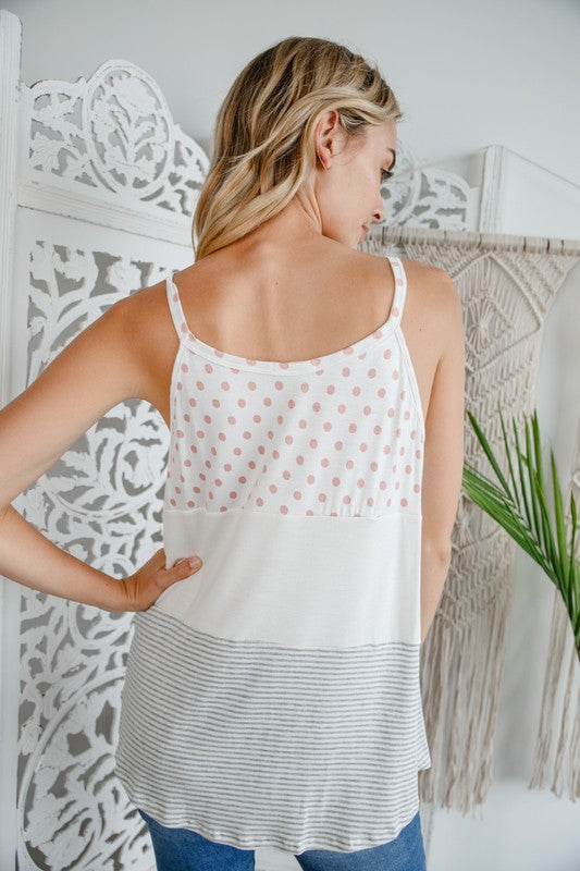 POLKA DOT STRIPE SOLID MIX TANK TOPPOLKA DOT STRIPE SOLID MIXED TANK TOP95% RAYON, 5% SPANDEX MADE IN USAS/M/L 2-2-2
Style: Casual
Print / Pattern: POLKA DOT STRIPE &amp; SOLID
Fit: Regular
Sleeve: Sl