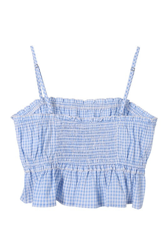 Blue gingham tank top*Blue gingham tank top*Pattern type : gingham *Sleeve length : sleeveless*Stretch : no stretch*Sheer : not lined, but not sheer*Care instruction : machine wash cold,