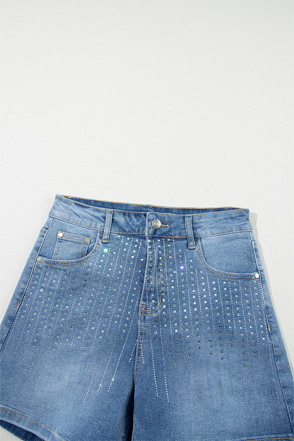 Ashleigh Blue Rhinestone Embellished Denim ShortsMaterial:55%Cotton+42%Viscose+3%Elastane

• Elevate your summer style with the shorts, featuring dazzling rhinestone embellishments that catch the light for a glamo