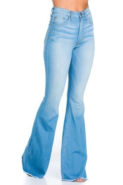 Logan Bell Bottom In Light Blue Inseam 30Full Length 5 Pocket Flare Jean features frayed hem, Light wash, whisker wash detail, Stretch denim, front and back pockets, 30" Inseam, Made in USA
Style: high rise