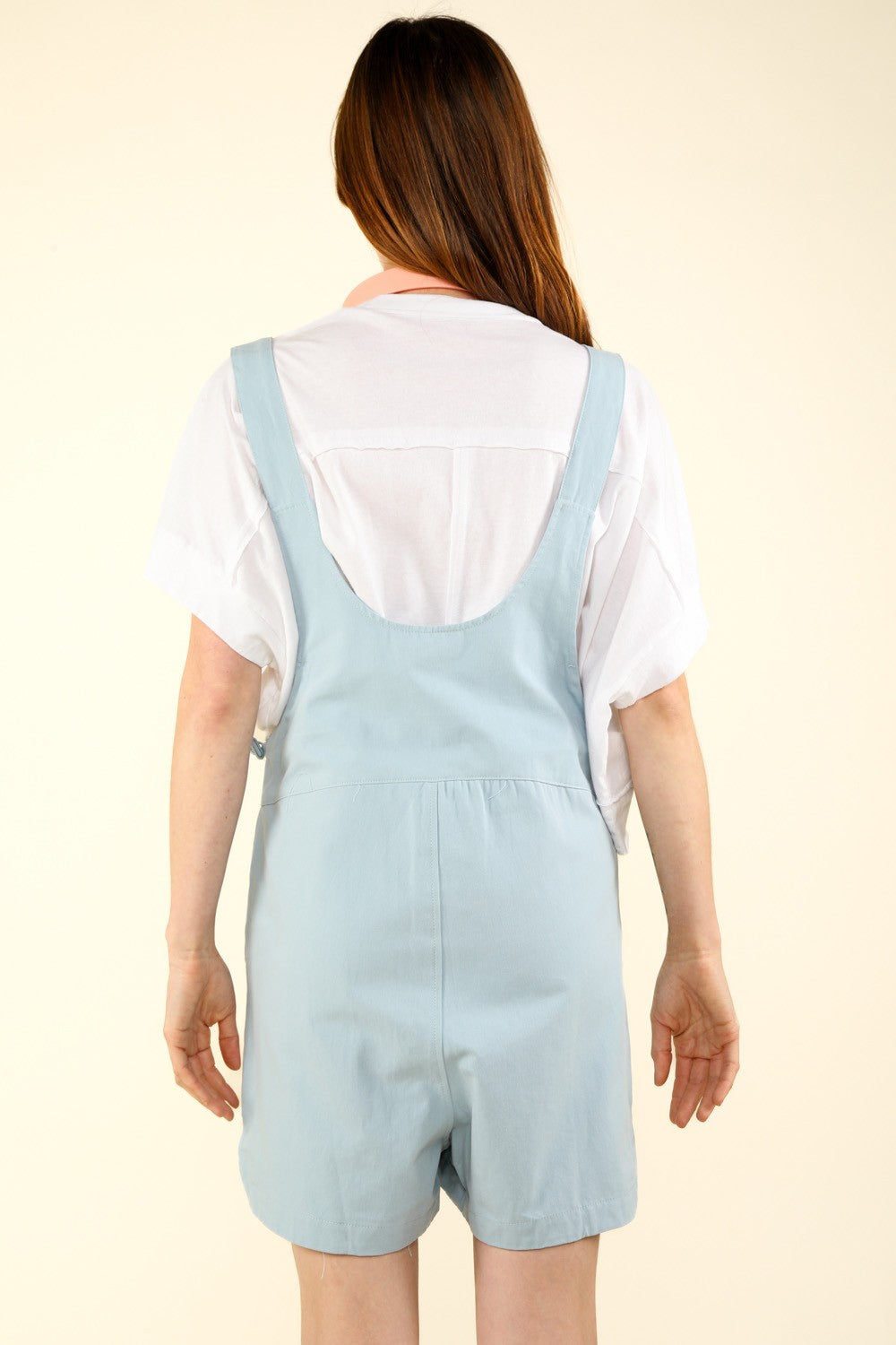 VERY J Adjustable Waist Suspender Overalls with PocketsGet ready for a casual and chic look with this sleeveless cotton romper featuring an adjustable waist and side pockets. The suspender's overall detail adds a trendy 