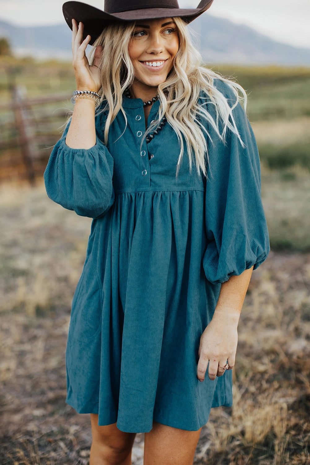 Light Blue Snap Button Empire Waist Lantern Sleeve Corduroy DressMaterial:100%Polyester

• Effortlessly chic, the mini dress exudes laid-back elegance with its soothing color and relaxed fit. 
• The soft corduroy fabric of this 