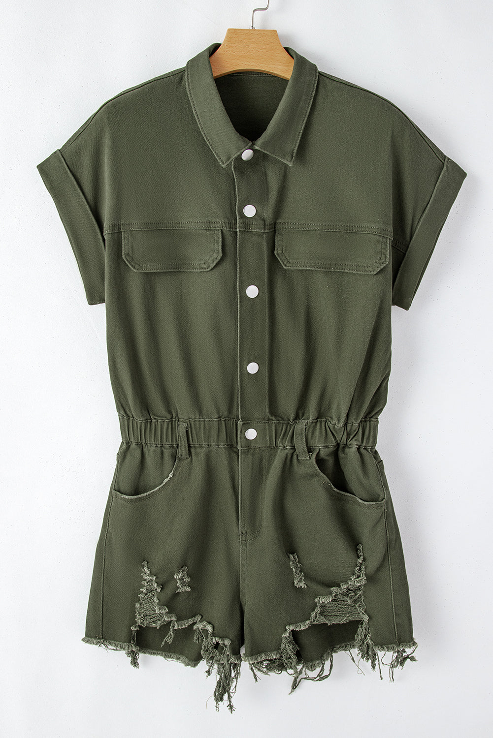 Moss Green Distressed Frayed Denim RomperMaterial:98%Cotton+2%Elastane

• This romper offers a comfortable and stretchy fit for all-day wear.
• The moss green hue brings a touch of nature-inspired charm, 