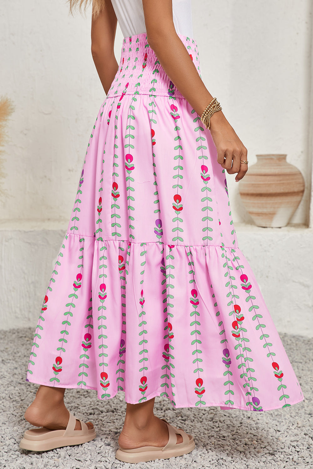 Pink Smocked Waist Tiered Maxi SkirtMaterial:100%Polyester

• Effortlessly chic in pink, this maxi skirt exudes a casual summer vibe perfect for daily wear.
• The shirred waist adds a touch of textur