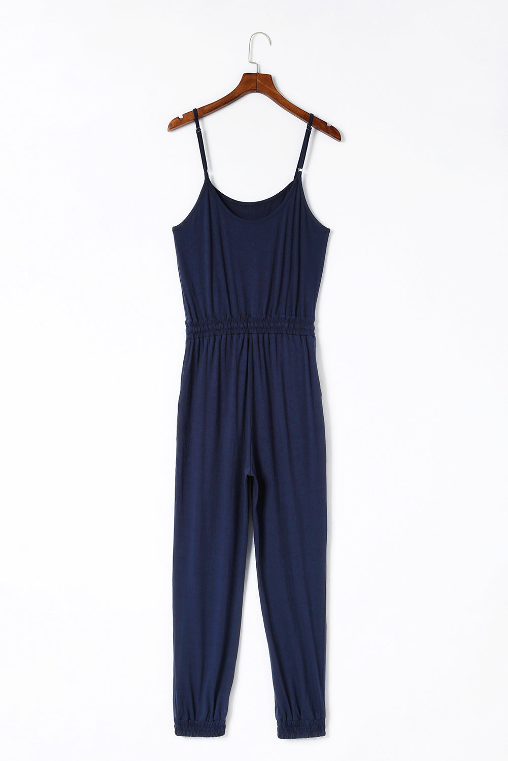 Dark Blue Pockets Drawstring Waist Spaghetti Strap JumpsuitMaterial:95%POLYESTER+5%ELASTANE



		An amazing jumpsuit to make customers feel chic and slim
	
	
		Spaghetti straps design is flirty and sexy
	
	
		Flatter