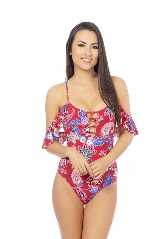 RED PAISLEY ONE PIECE SWIMSUITRed paisley printed deep scoop one piece featuring ladder front detail, ruffled sleeves, and adjustable crisscross back. Moderate to full coverage bottom, removable 