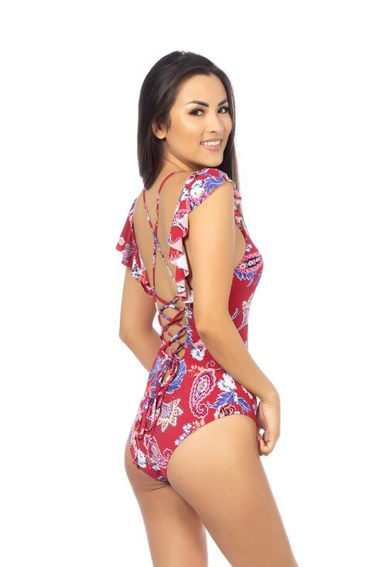 RED PAISLEY ONE PIECE SWIMSUITRed paisley printed deep scoop one piece featuring ladder front detail, ruffled sleeves, and adjustable crisscross back. Moderate to full coverage bottom, removable 