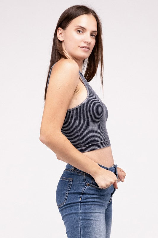 Washed Ribbed Cropped V-Neck Tank TopThe Washed Ribbed Cropped V-Neck Tank Top offers a stylish and comfortable option for your wardrobe. Made from ribbed fabric with a washed finish, it exudes a casual