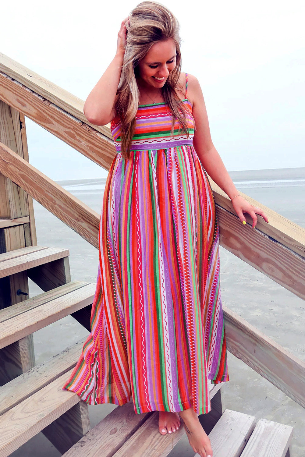 Multicolour Boho Striped Spaghetti Strap Smocked Back Maxi DressMaterial:100%Polyester

• Embrace a vibrant blend of colors in this maxi dress, perfect for daily wear with its relaxed, sleeveless design.
• The shirred back ensu