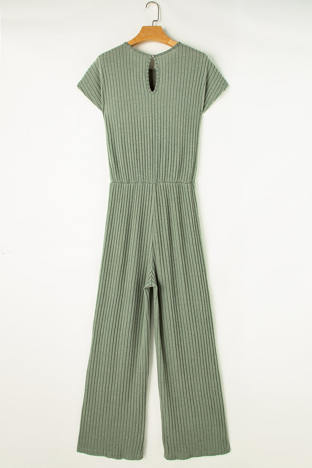 Grass Green Solid Color Ribbed Short Sleeve Wide Leg JumpsuitMaterial:85%Polyester+10%Viscose+5%Elastane



		The jumpsuit is a versatile and trendy one-piece outfit, featuring a solid color design that offers a sleek and mi